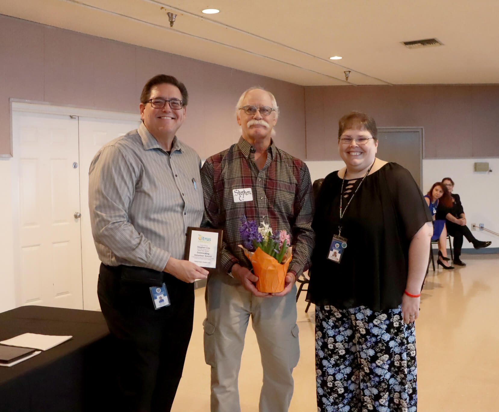 Library Director, Eric Head; Outstanding Volunteer award winner, Stephen Cox; Floral City Library Customer Service Specialist, Beverly Wojnar