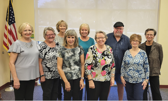 (front L to R) –Gail Roughgarden, Cathy Lindell, Laura Peters, Mary Ann Kuebler, and April McLaughlin; (back L to R) – President Mary Kay Pavilionis, Treasurer Cathy Susi, Vice President Edward Geer, and Recording Secretary Karen Slaska. Not pictured: Corresponding Secretary Alvina Bragin.