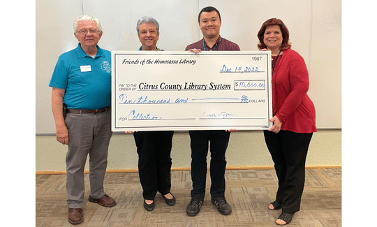 Pictured: (L to R) – Ken Jones, Treasurer; Cathy Trask, President; Adam Chang, Citrus Libraries Region Manager; Renee Thompson, Homosassa Branch Supervisor