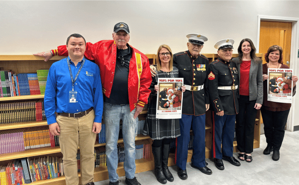 – 2023 Toys for Tots: Pictured L to R – Library Director, Adam Chang; Citrus County Toys for Tots Coordinator, Paul Pilney; Library Acquisitions Manager, Karen Fellows; USMC Korean War Veteran CPL Walt Clevenger; USMC Vietnam Veteran CPL Clarence Peres; Coastal Region Library Branch Supervisor, Danielle Damato Doty; Library Region Manager, Renee Thompson.