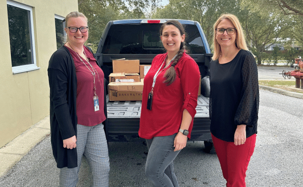 Library Public Relations Coordinator, Taylor Keeran; Carter Street Head Start Staff, Brianna Porro; Library Acquisitions Manager, Karen Fellows